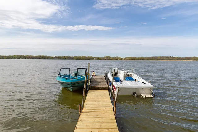 a view of backyard with large trees