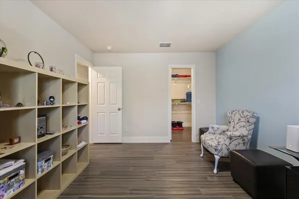 a living room with furniture and decor