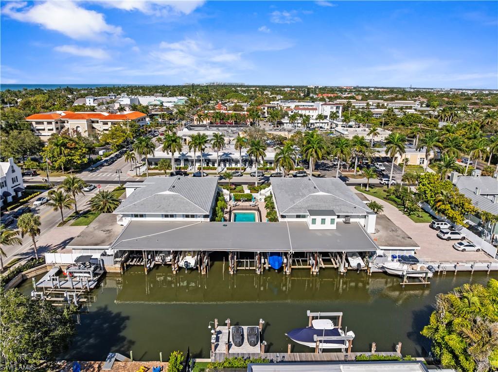 320 14th Avenue South, Unit 320B Naples, FL 34102 - Photo 12 of 14 an aerial view of residential houses with outdoor space