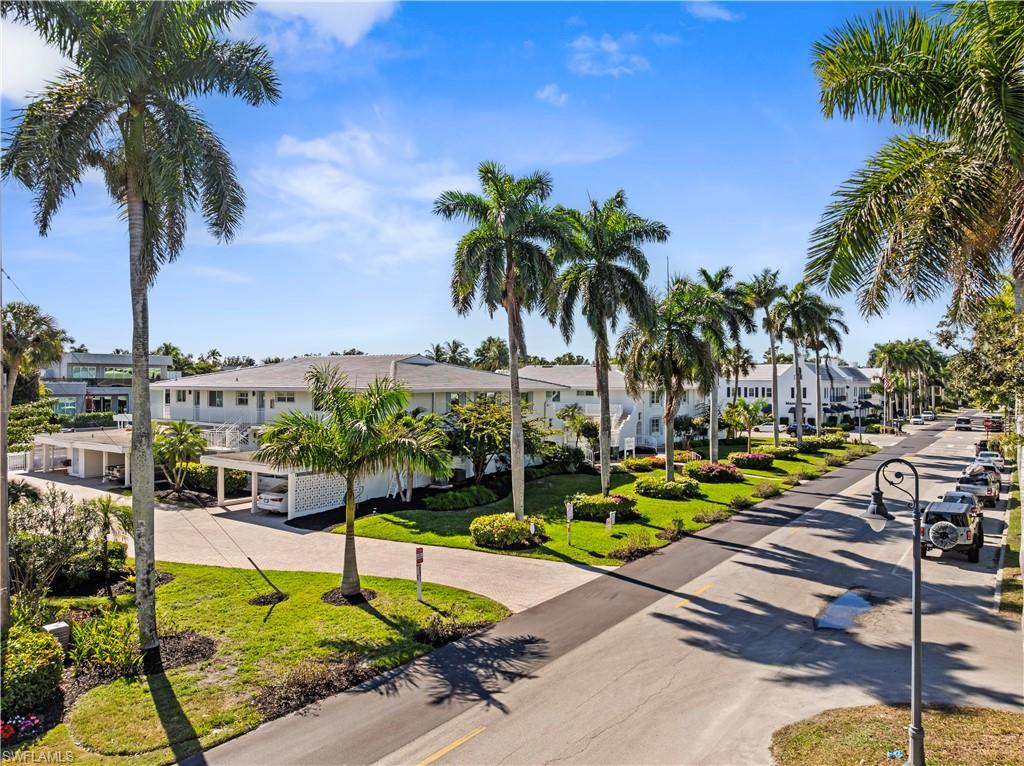 320 14th Avenue South, Unit 320B Naples, FL 34102 - Photo 14 of 14 a view of a park with palm trees