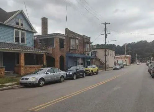 a car parked in front of a house