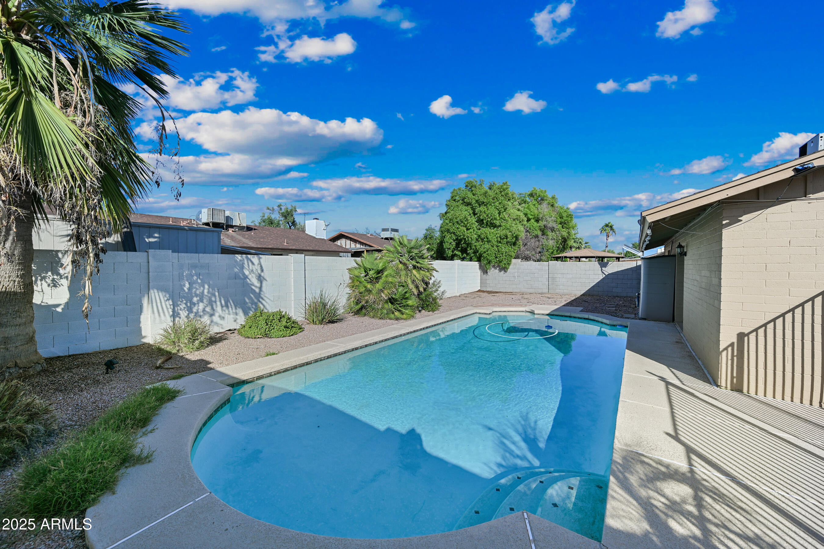 5558 West Cortez Street Glendale, AZ 85304 - Photo 17 of 34 a view of a roof deck with chair and table