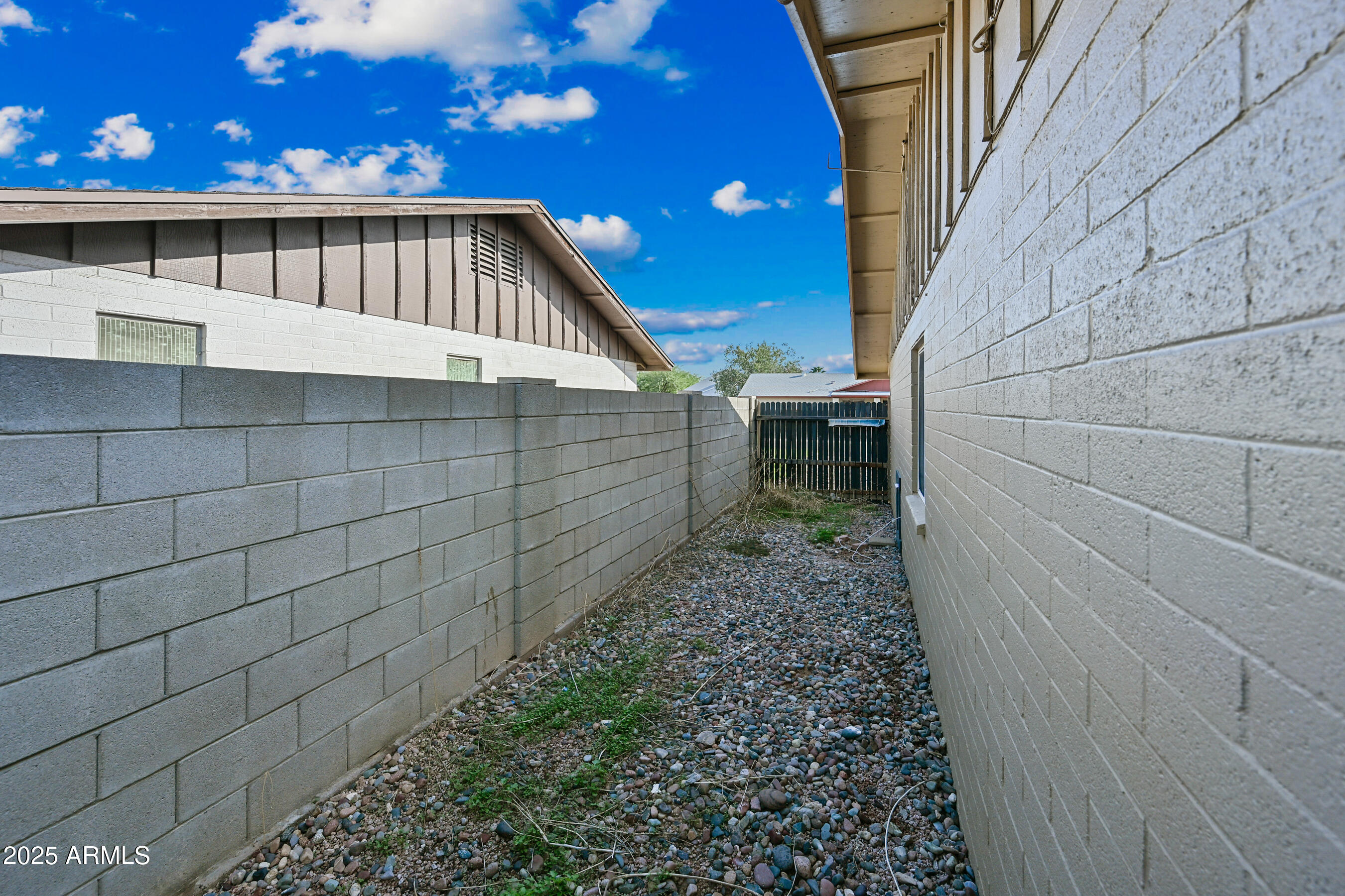 5558 West Cortez Street Glendale, AZ 85304 - Photo 20 of 34 a view of backyard with wooden fence