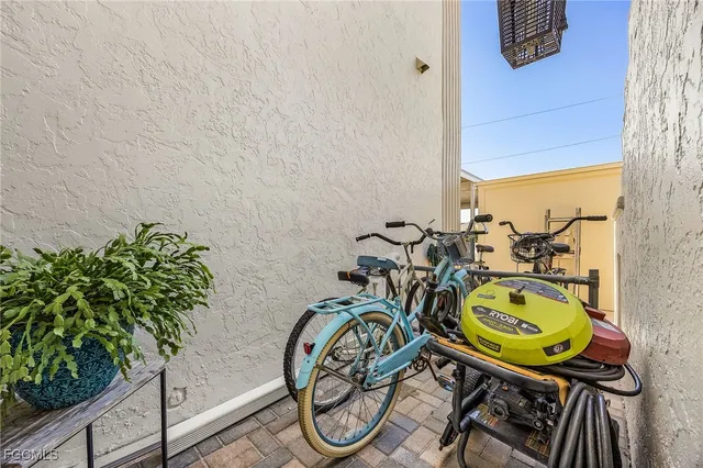 a view of a swimming pool with chairs
