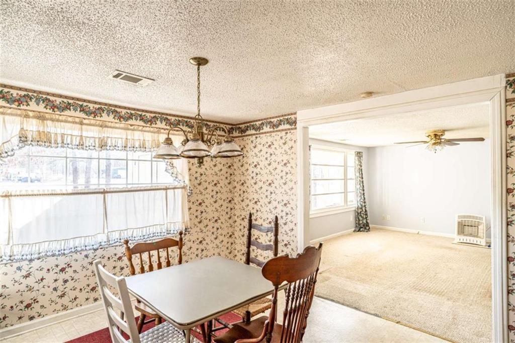 4383 Martha Berry Highway Rome, GA 30165 - Photo 12 of 27 a view of a dining room with furniture and a window