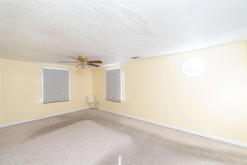4383 Martha Berry Highway Rome, GA 30165 - Photo 13 of 27 an empty room with a empty space and a window