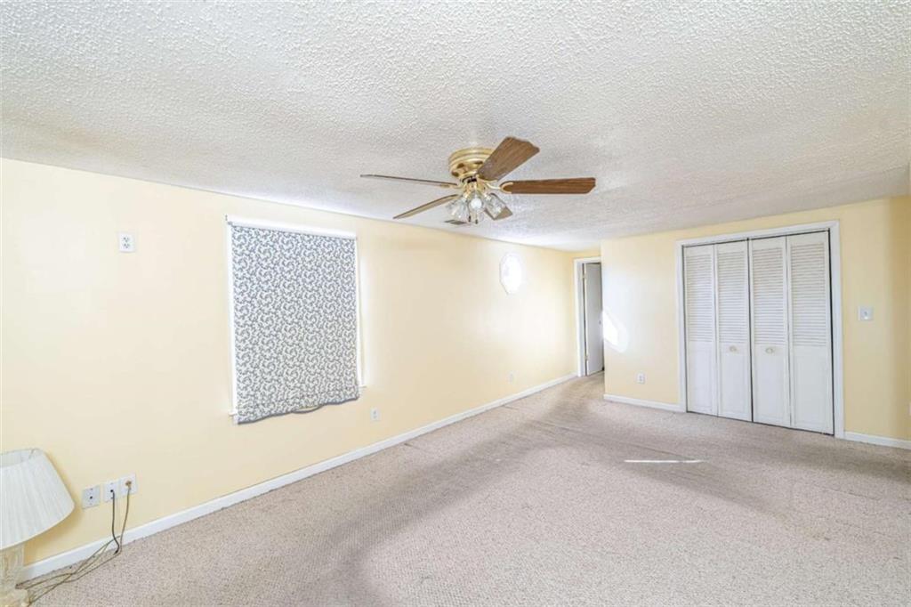 4383 Martha Berry Highway Rome, GA 30165 - Photo 14 of 27 a view of an empty room with a window