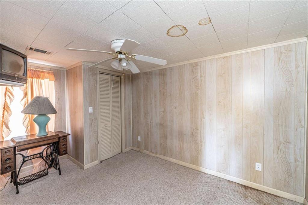 4383 Martha Berry Highway Rome, GA 30165 - Photo 16 of 27 a workspace room with chandelier fan and windows