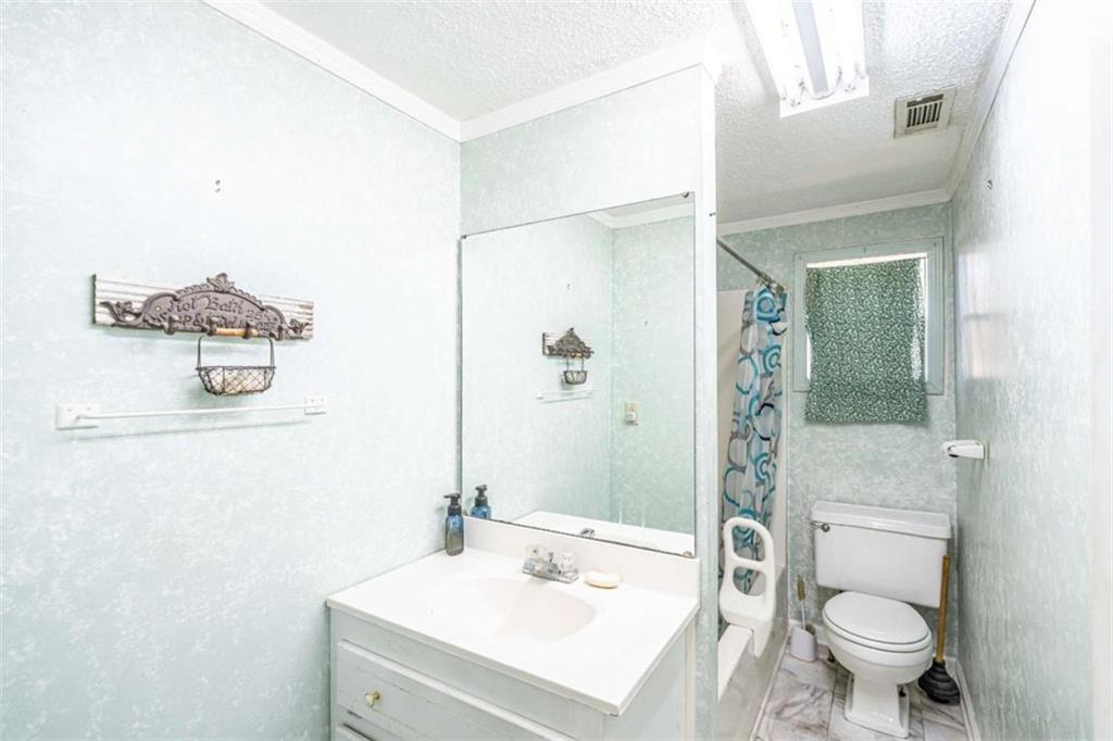 4383 Martha Berry Highway Rome, GA 30165 - Photo 18 of 27 a bathroom with a sink toilet and shower