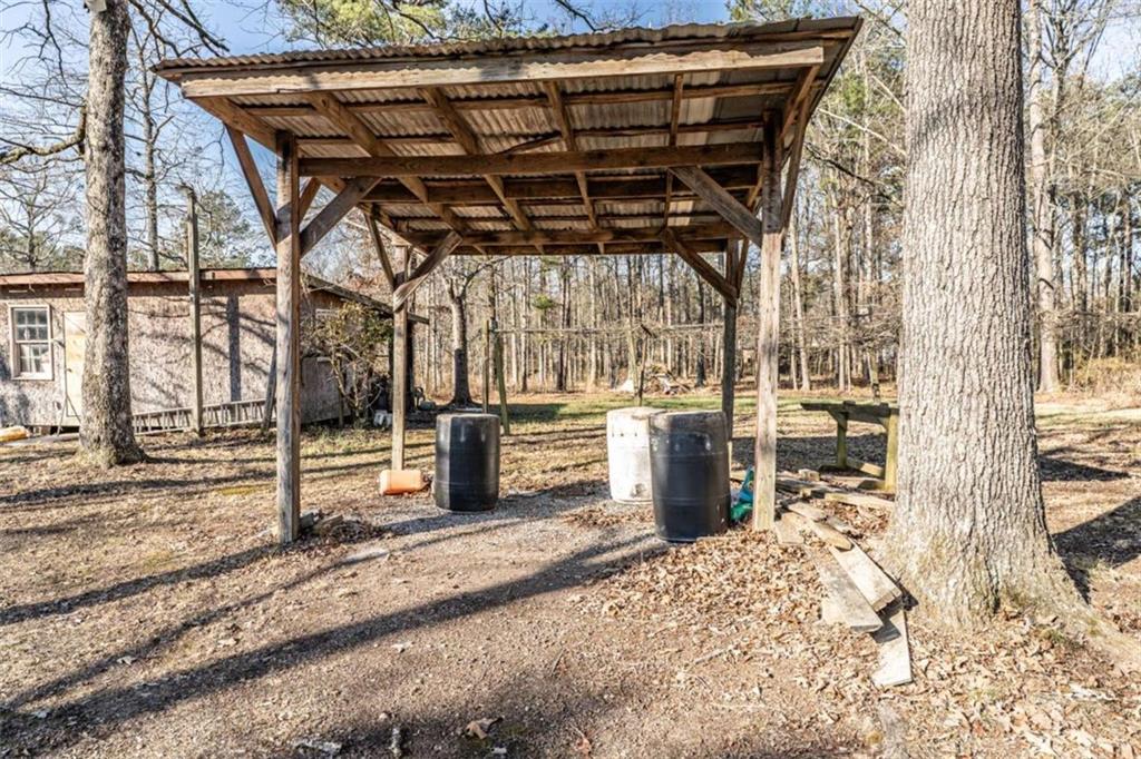 4383 Martha Berry Highway Rome, GA 30165 - Photo 25 of 27 a view of a patio with wooden fence
