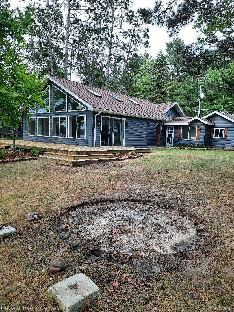 4823 Kokosing Road Hale, MI 48739 - Photo 8 of 54 lake front with fire pit