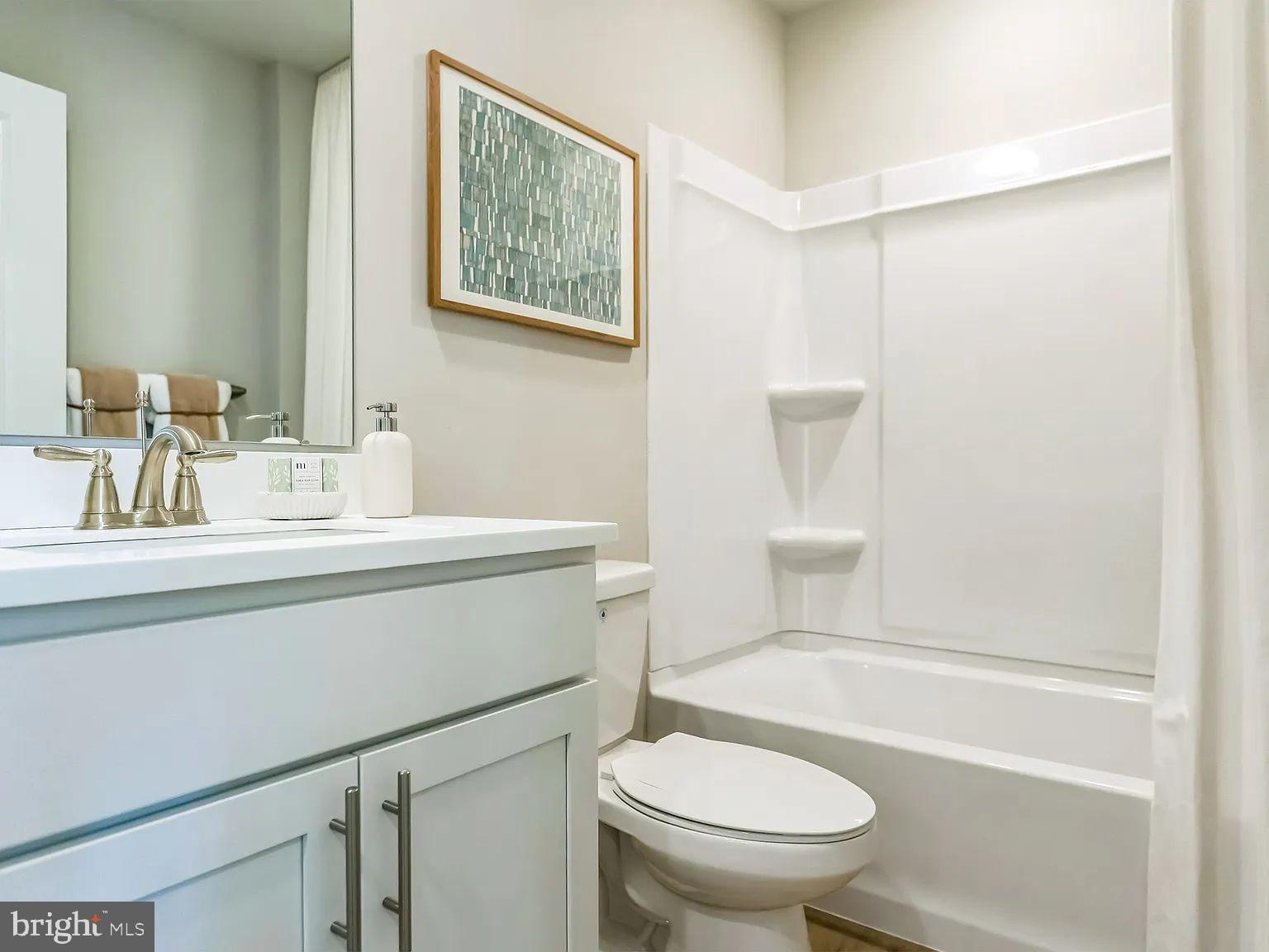 171 Sandy Rdg Road Sicklerville, NJ 08081 - Photo 11 of 13 a bathroom with a sink a toilet and shower