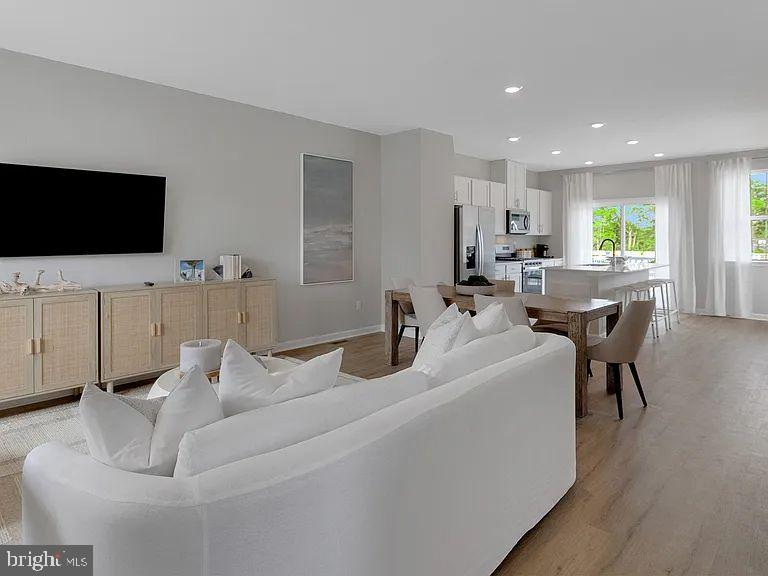 171 Sandy Rdg Road Sicklerville, NJ 08081 - Photo 6 of 13 a living room with furniture and a flat screen tv