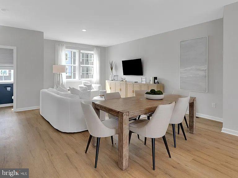 171 Sandy Rdg Road Sicklerville, NJ 08081 - Photo 9 of 13 a view of a dining room with furniture and wooden floor