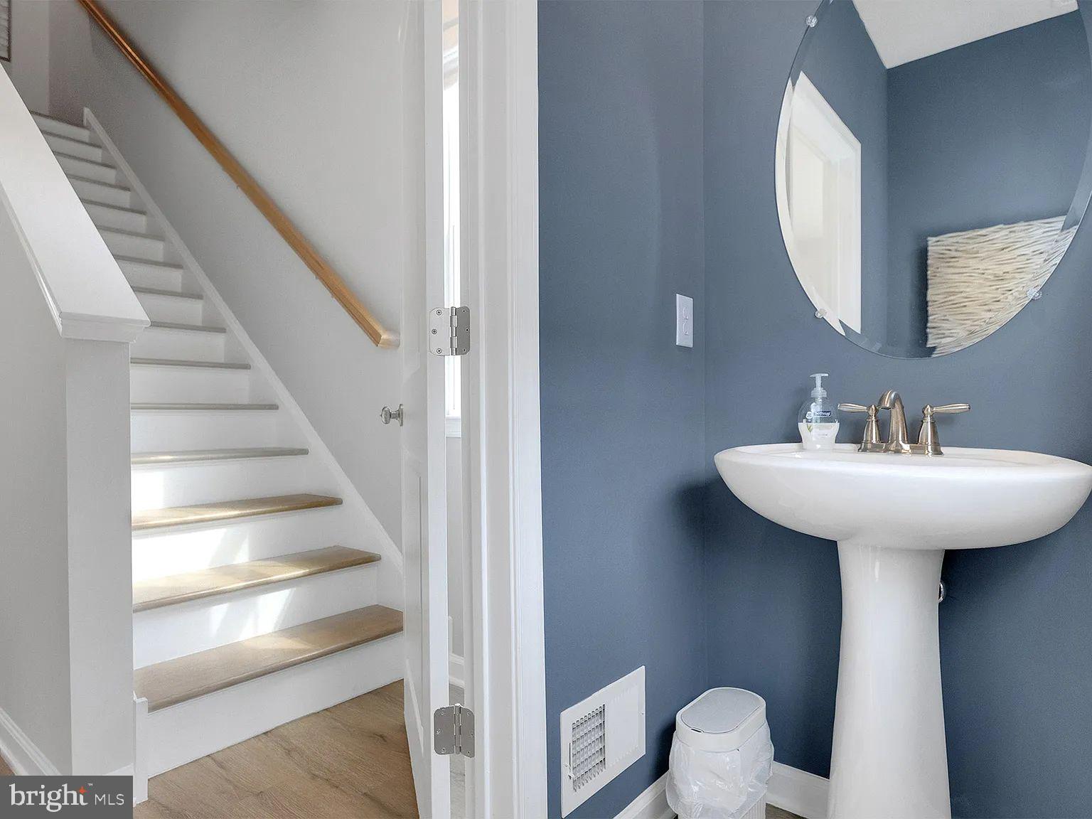 171 Sandy Rdg Road Sicklerville, NJ 08081 - Photo 10 of 13 a bathroom with a sink toilet and a mirror