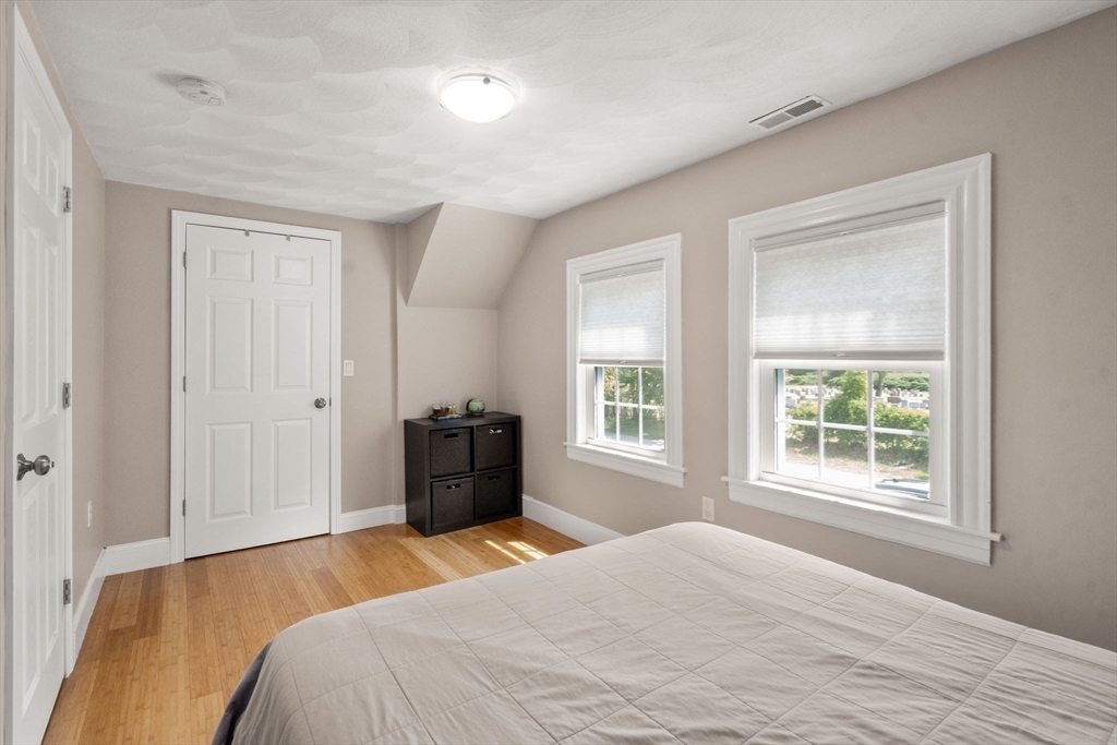 46 MacArthur Road Stoneham, MA 02180 - Photo 24 of 41 a bedroom with a bed and a window