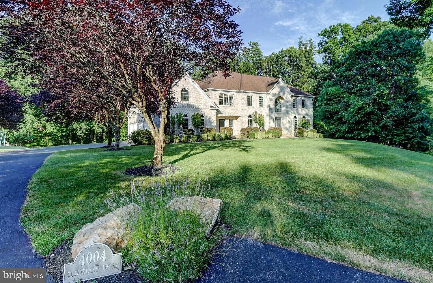 CUSTOM BRICK COLONIAL WITH CONTEMPORARY FLAIR
