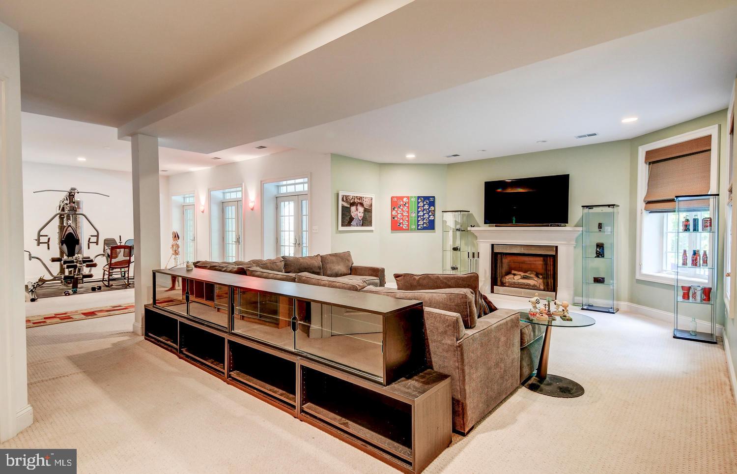 4004 Cloverland Drive Phoenix, MD 21131 - Photo 40 of 60 LOWER LEVEL FAMILY ROOM WITH GAS FIREPLACE