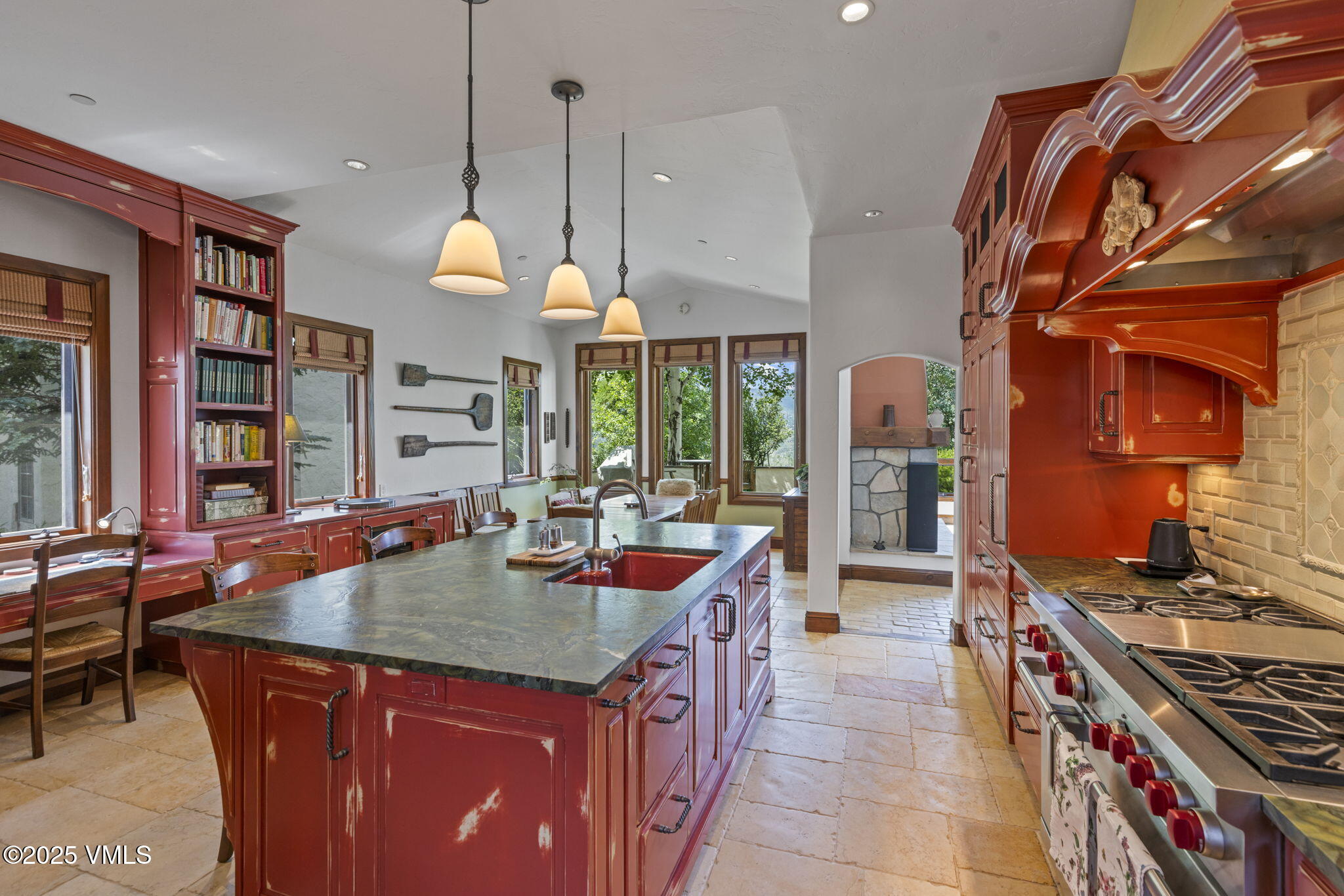 225 Alcazar Drive Edwards, CO 81632 - Photo 13 of 39 a kitchen with stainless steel appliances granite countertop a stove and a sink