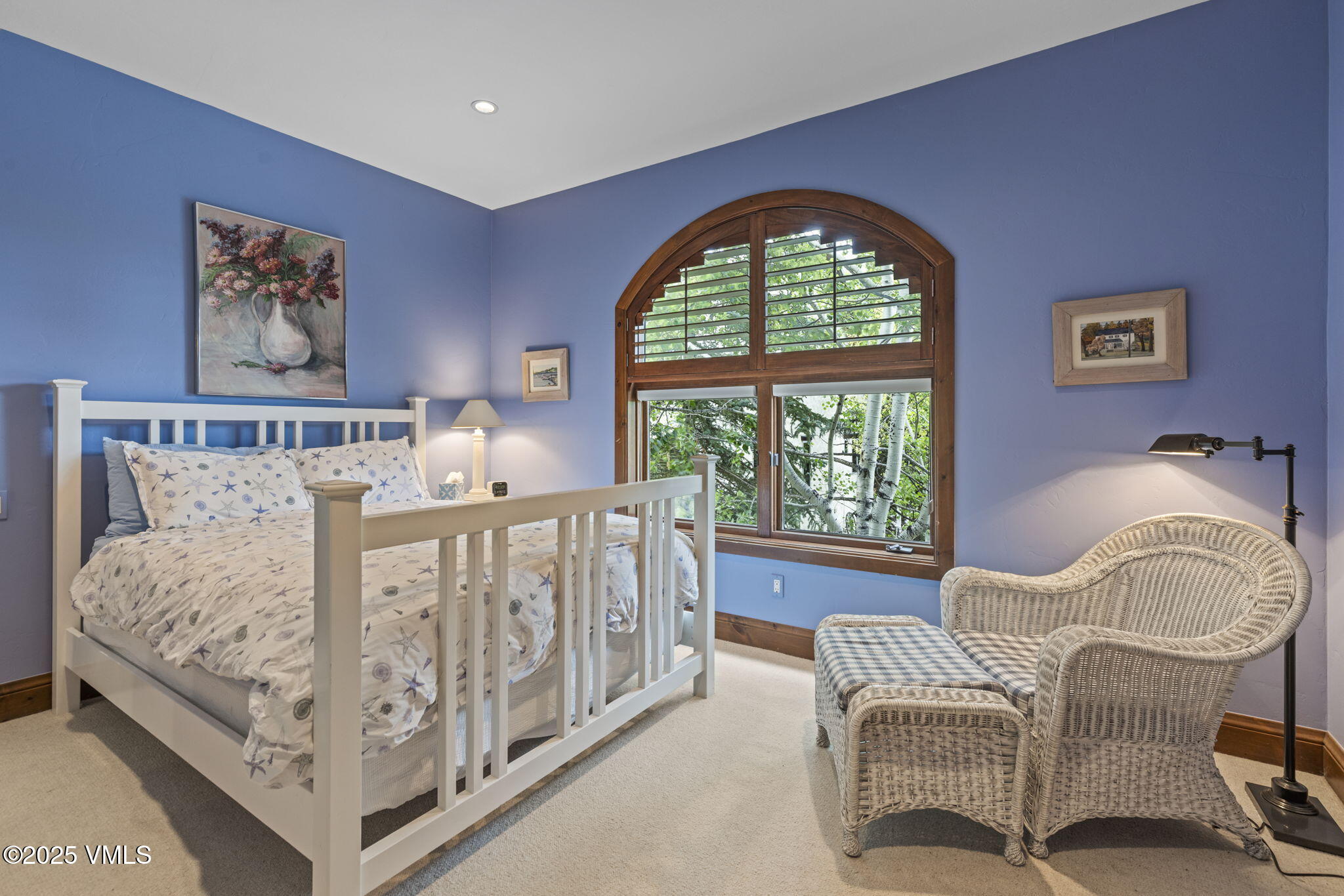 225 Alcazar Drive Edwards, CO 81632 - Photo 24 of 39 a bedroom with a bed and a large window