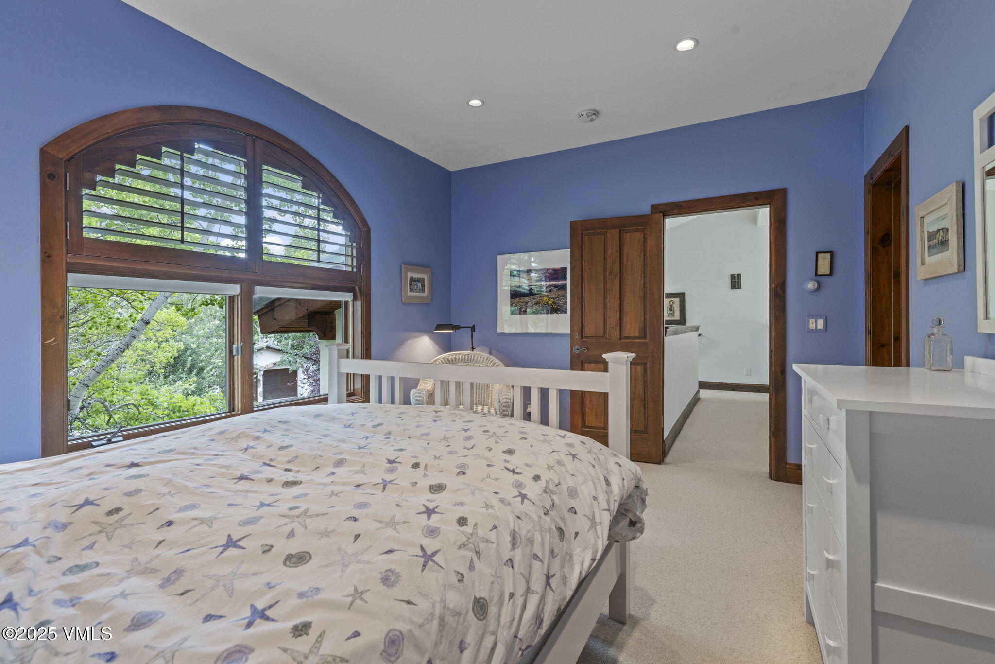 225 Alcazar Drive Edwards, CO 81632 - Photo 25 of 39 a bedroom with a bed and a large window