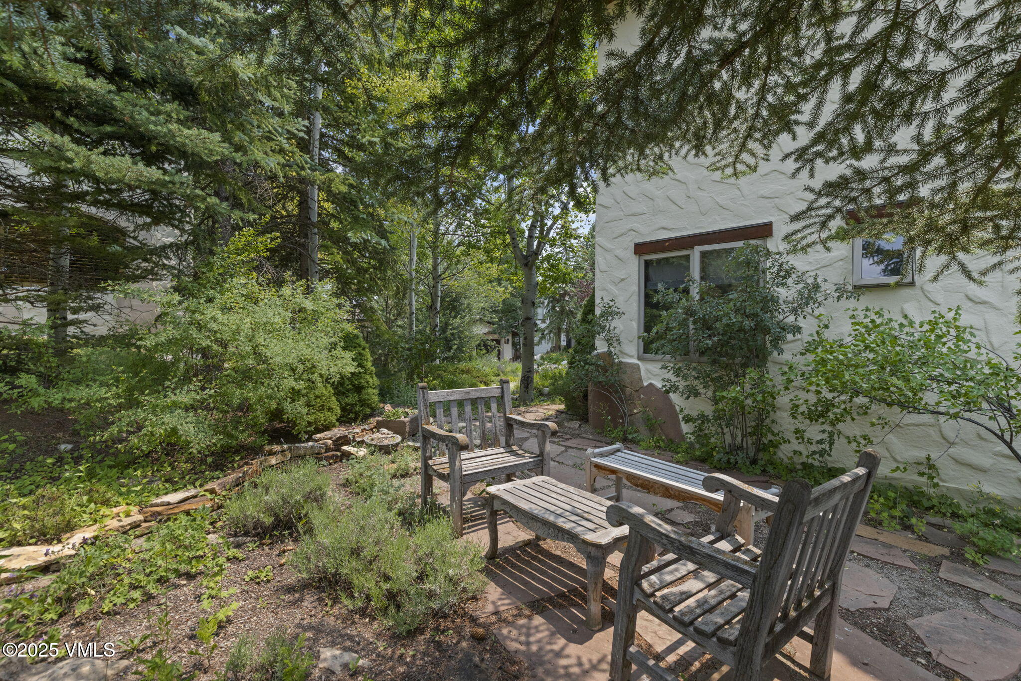 225 Alcazar Drive Edwards, CO 81632 - Photo 29 of 39 a view of backyard with seating area and green space
