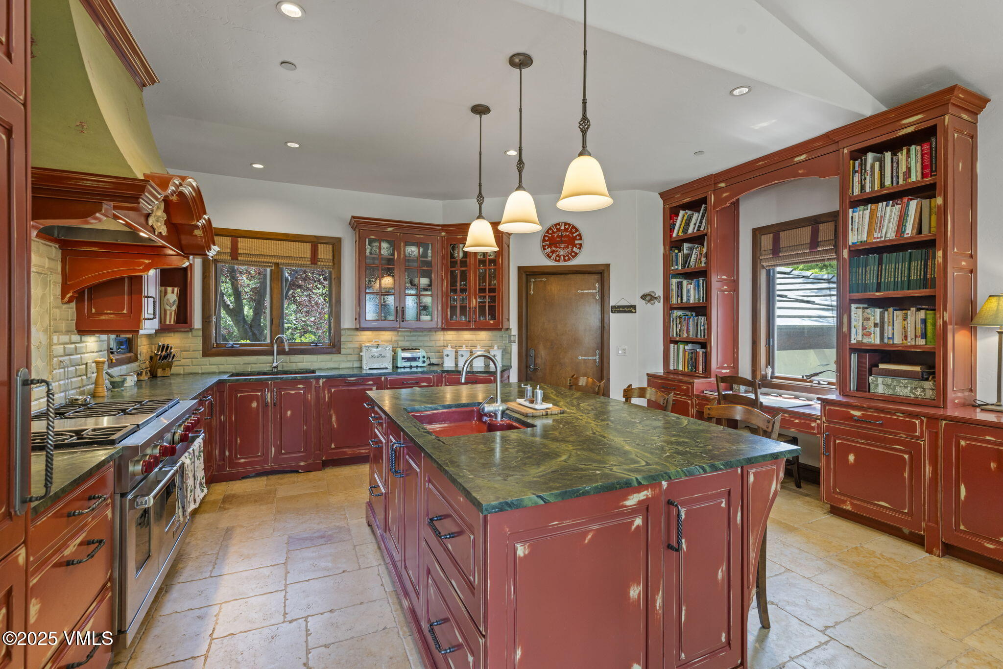 225 Alcazar Drive Edwards, CO 81632 - Photo 7 of 39 a kitchen with stainless steel appliances granite countertop a stove a sink and a refrigerator