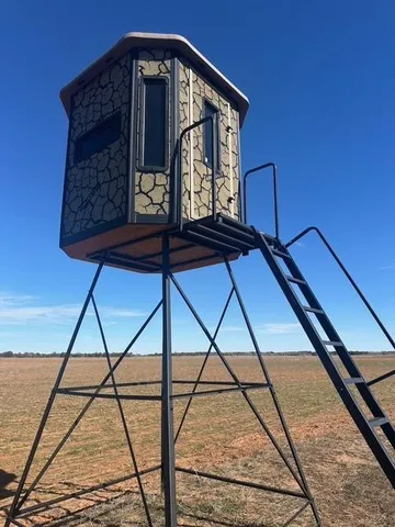 a view of a city with lush green forest