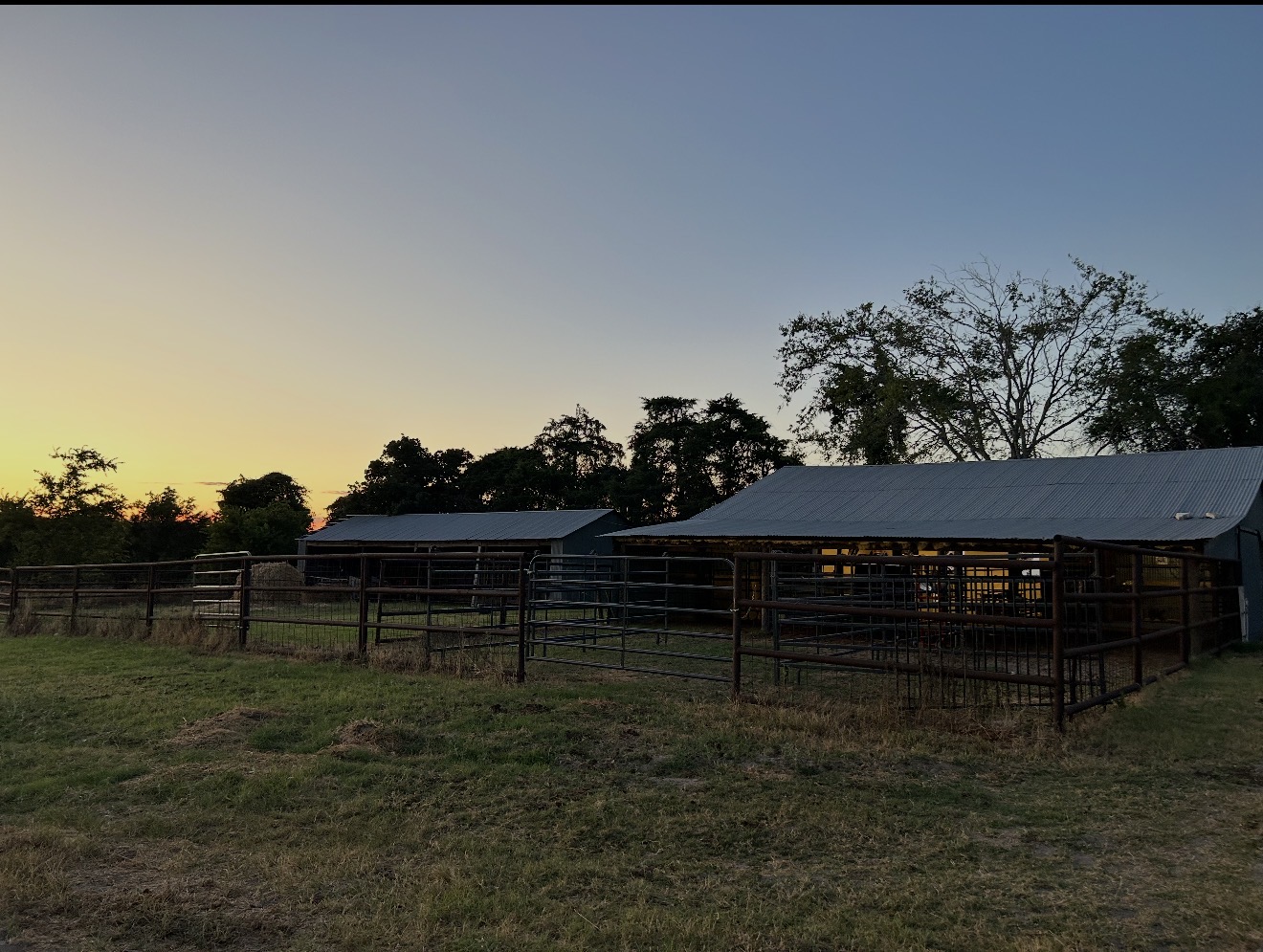 15892 Wood Road Holland, TX 76534 - Photo 26 of 34 Functional barn structures and fenced paddocks create an ideal equestrian or livestock setup.