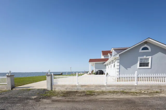 a open kitchen with stainless steel appliances granite countertop a sink and wooden cabinets