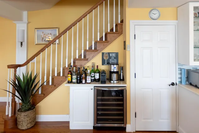 a view of a lake with a table and a chair