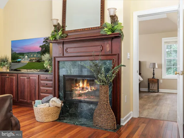 a kitchen with stainless steel appliances granite countertop a stove refrigerator and a sink