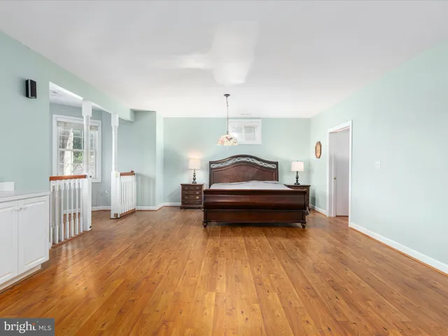 a kitchen with stainless steel appliances a stove microwave and cabinets