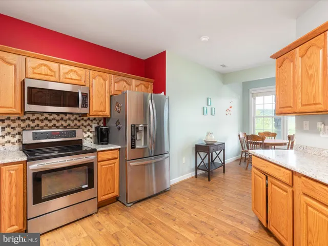 a view of a backyard of the house