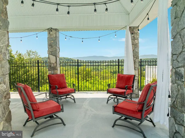 a view of a yard with an outdoor space
