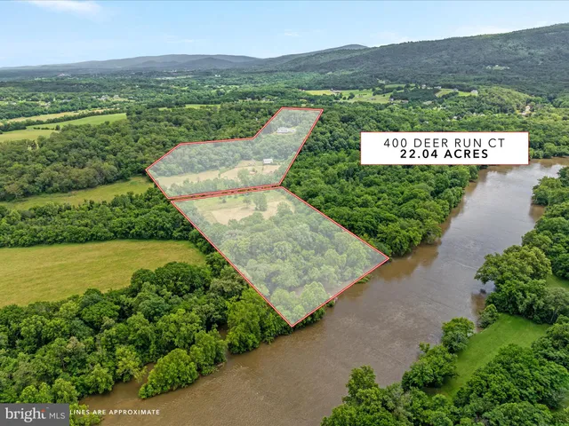 a view of lake with green space