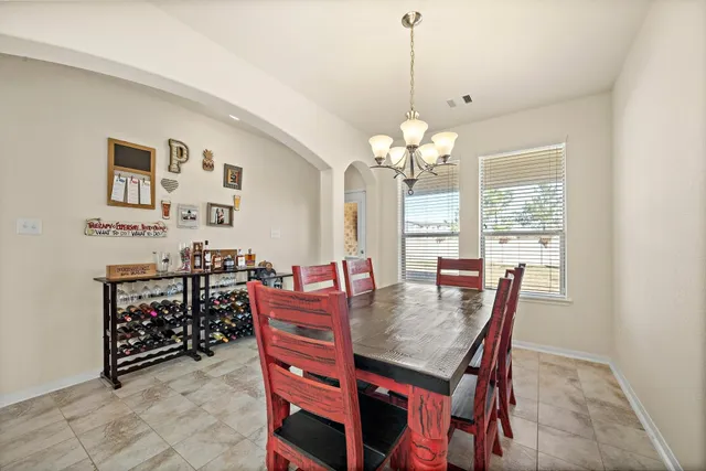 a view of a dining room with furniture