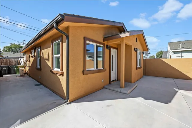 a front view of a house with a garage