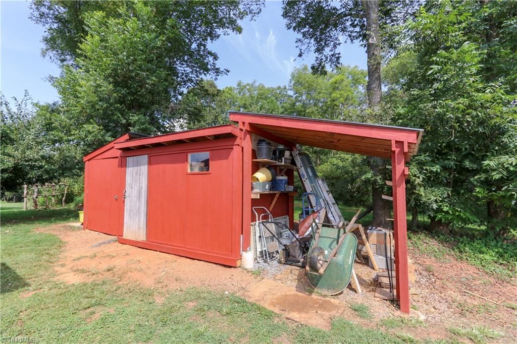 2065 Christian Home Church Road Traphill, NC 28685 - Photo 22 of 29 Shed large enough for all your tools and equipment!