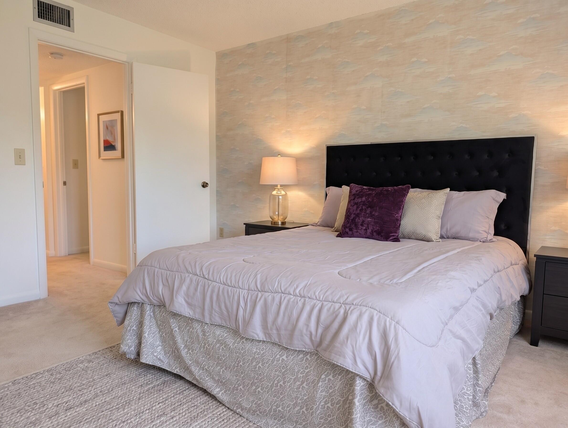 327 Pine Ridge Circle, Unit B2 Greenacres, FL 33463 - Photo 9 of 18 Primary Bedroom