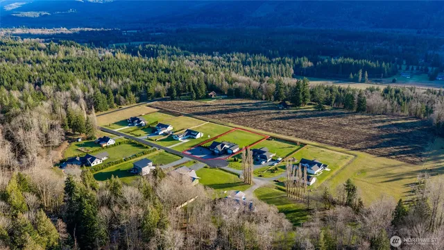 a view of a yard with an outdoor space