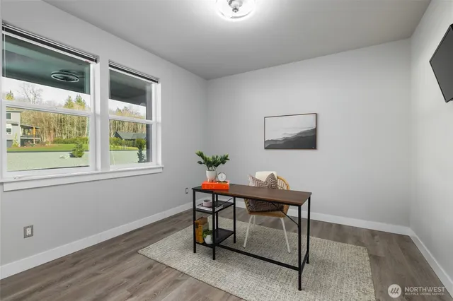 a room with a table and a window