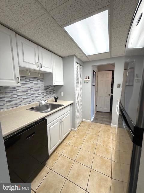 111 Village Walk Exton, PA 19341 - Photo 8 of 10 a kitchen with a sink a stove cabinets and a window
