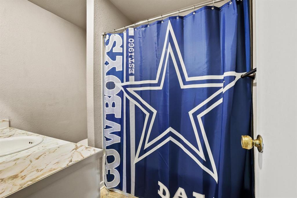 606 Hunter Street Bonham, TX 75418 - Photo 8 of 15 a view of walk in closet