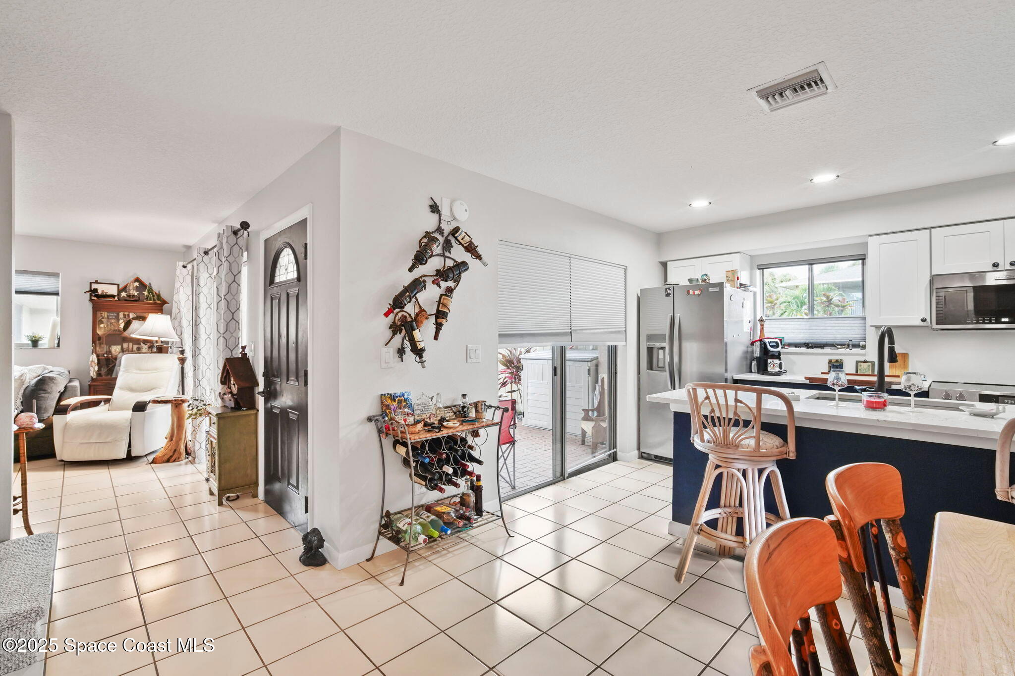 4148 Prime Avenue, Unit 1504 Rockledge, FL 32955 - Photo 11 of 30 a view of a dining room kitchen and furniture