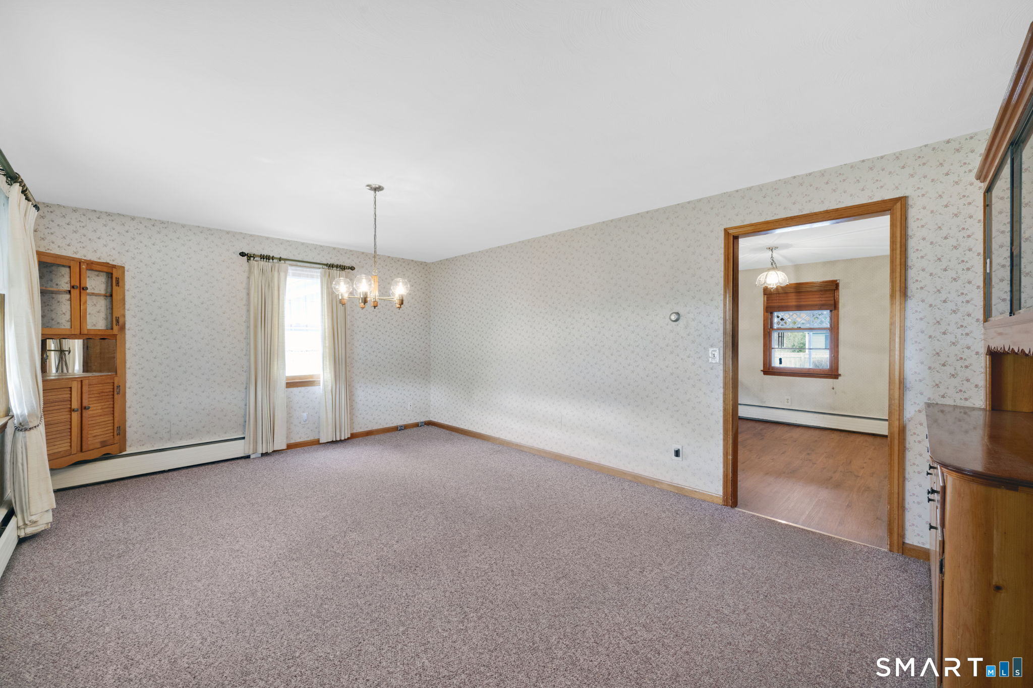 10 Helena Lane Windsor Locks, CT 06096 - Photo 14 of 36 a view of an empty room with closet and a window