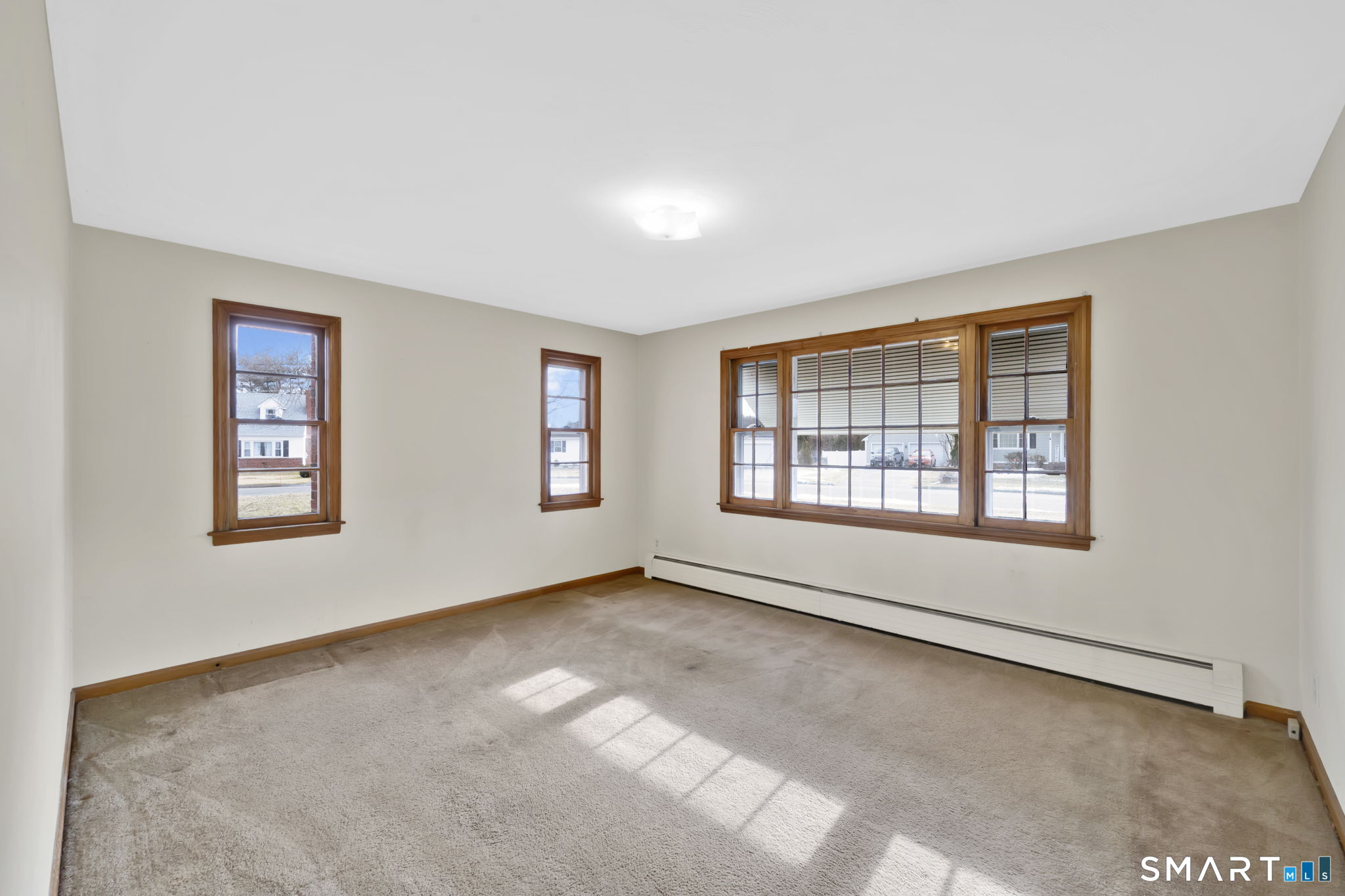 10 Helena Lane Windsor Locks, CT 06096 - Photo 16 of 36 a view of an empty room with a window