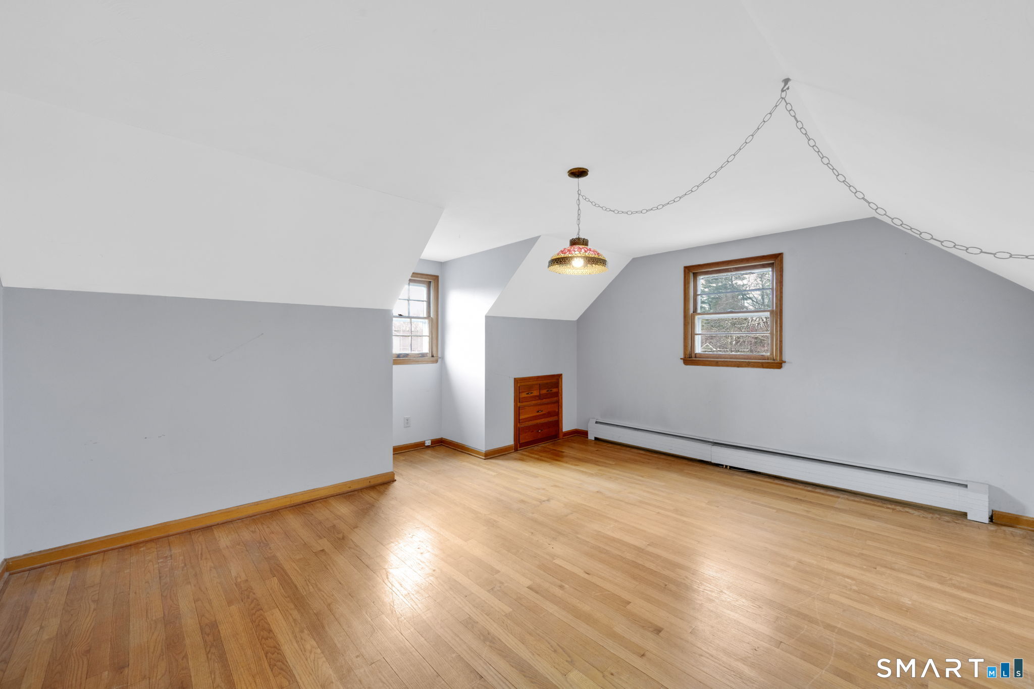 10 Helena Lane Windsor Locks, CT 06096 - Photo 23 of 36 wooden floor in an empty room with a window