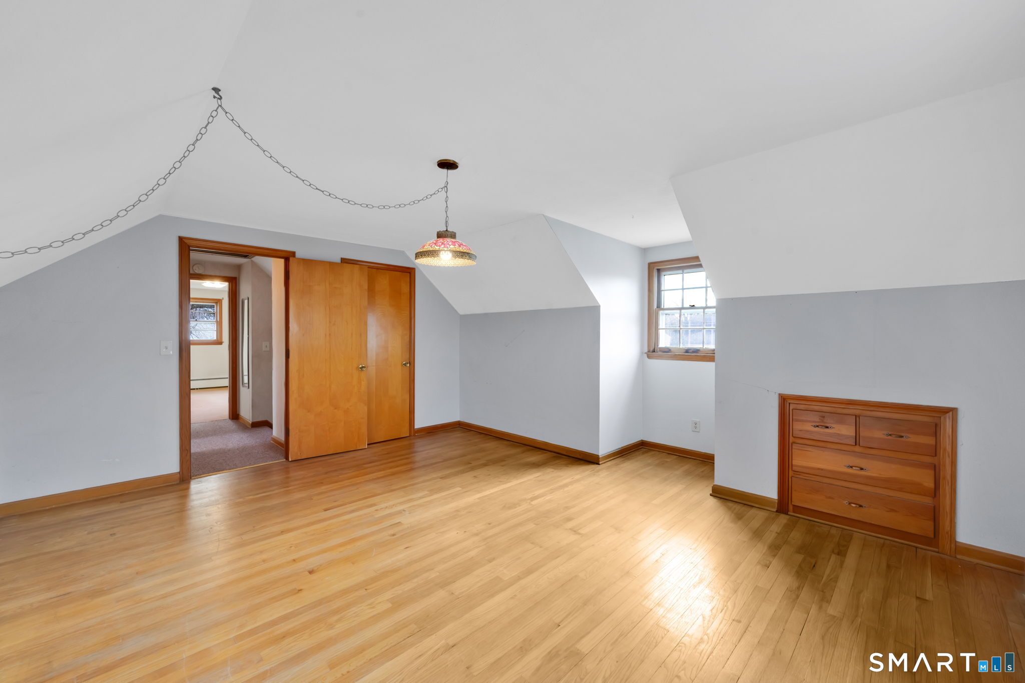 10 Helena Lane Windsor Locks, CT 06096 - Photo 24 of 36 an empty room with wooden floor and windows
