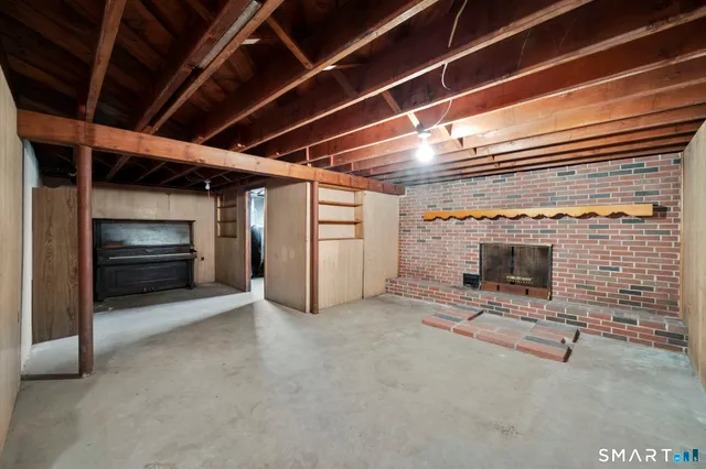 a view of room with refrigerator and stove